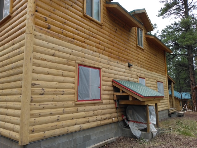 Log cabin side after sandblasting