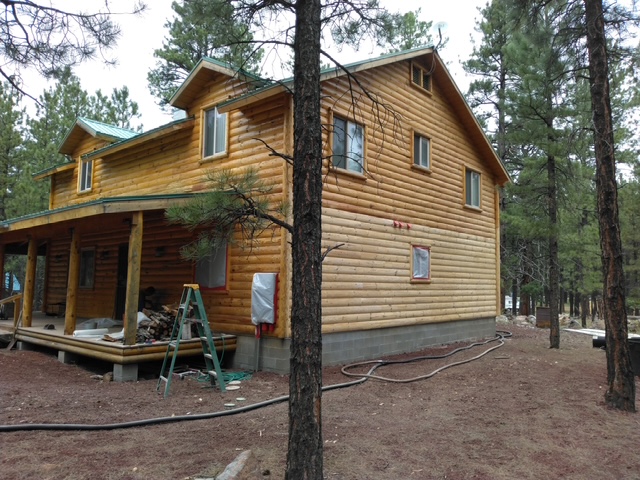Log cabin exterior before sandblasting